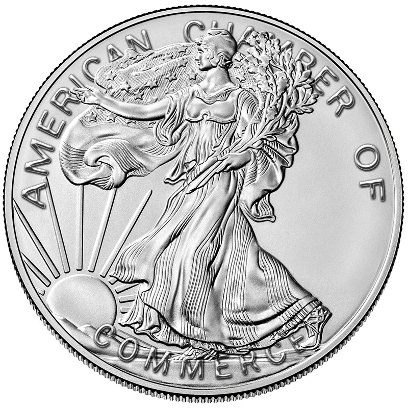 a beautiful silver dollar with lady liberty in a flowing dress, modified with the chamber's name