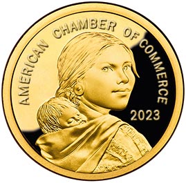 sacagawea dollar coin modified with the chamber name to compliment old painting of her and lewis and clark